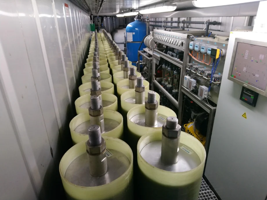 RCDT membrane modules of a ROTREAT leachate treatment plant: pressure pipe rows with permeate outlets, filter vessels and control cabinet